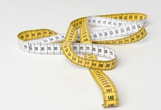 tape measure to measure the penis after augmentation with soda